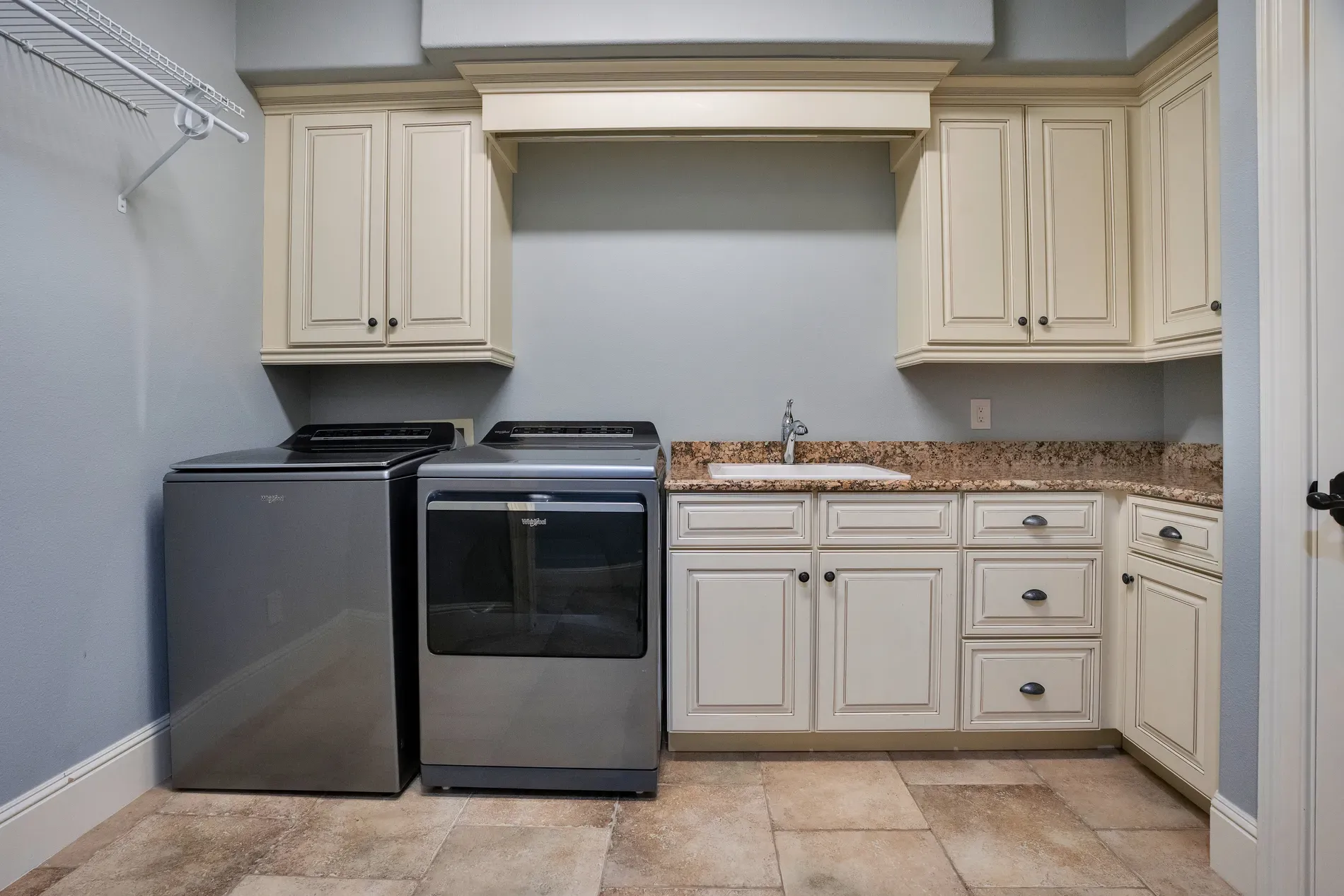 Okay, the laundry zone. soft greys and creams. Cabinets look nicer than my kitchen.
