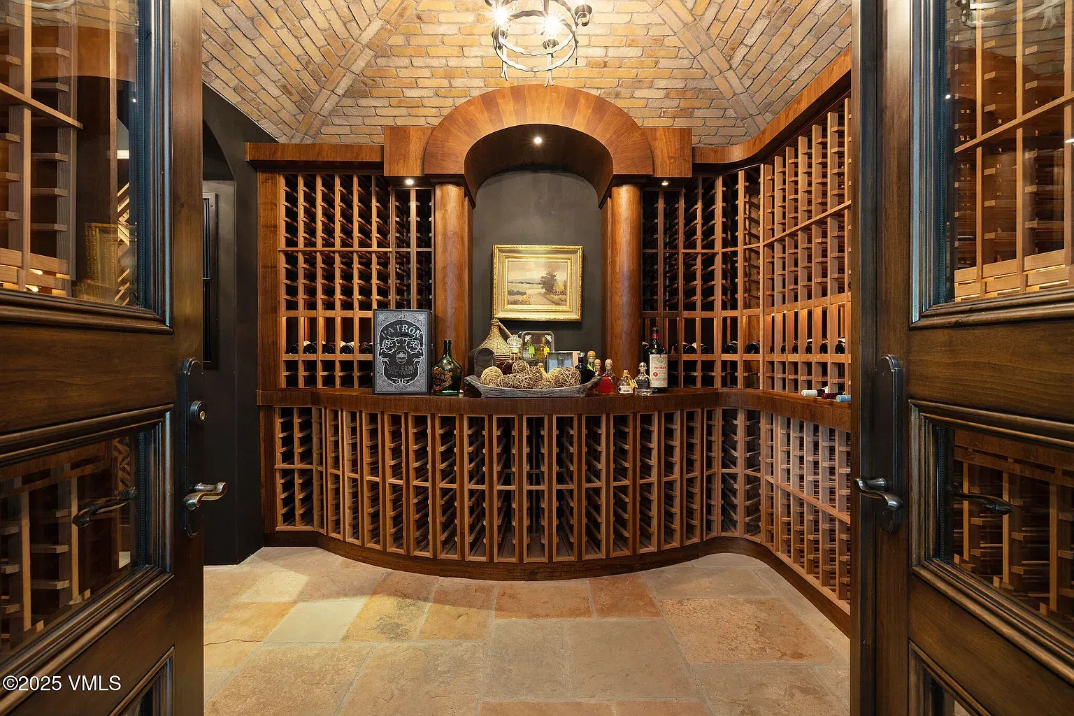 Here's the wine cave. arched brick, lattice racks. Looks serious about merlot.