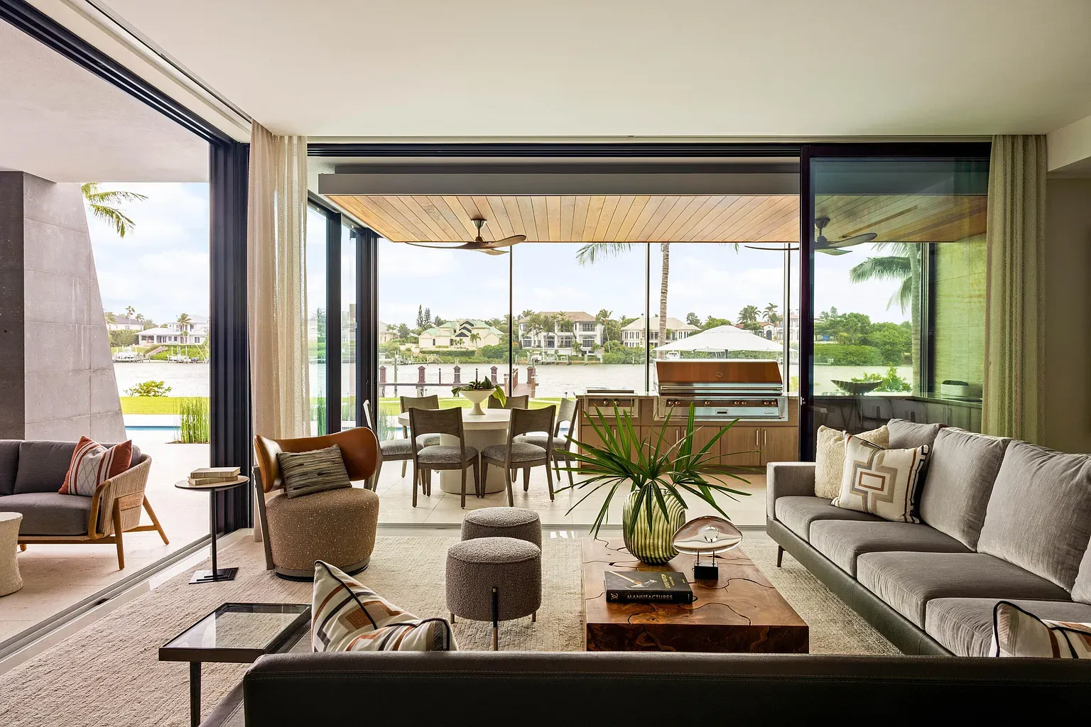 Another lounge—gray tones, warm wood. From this angle, it's basically all water.