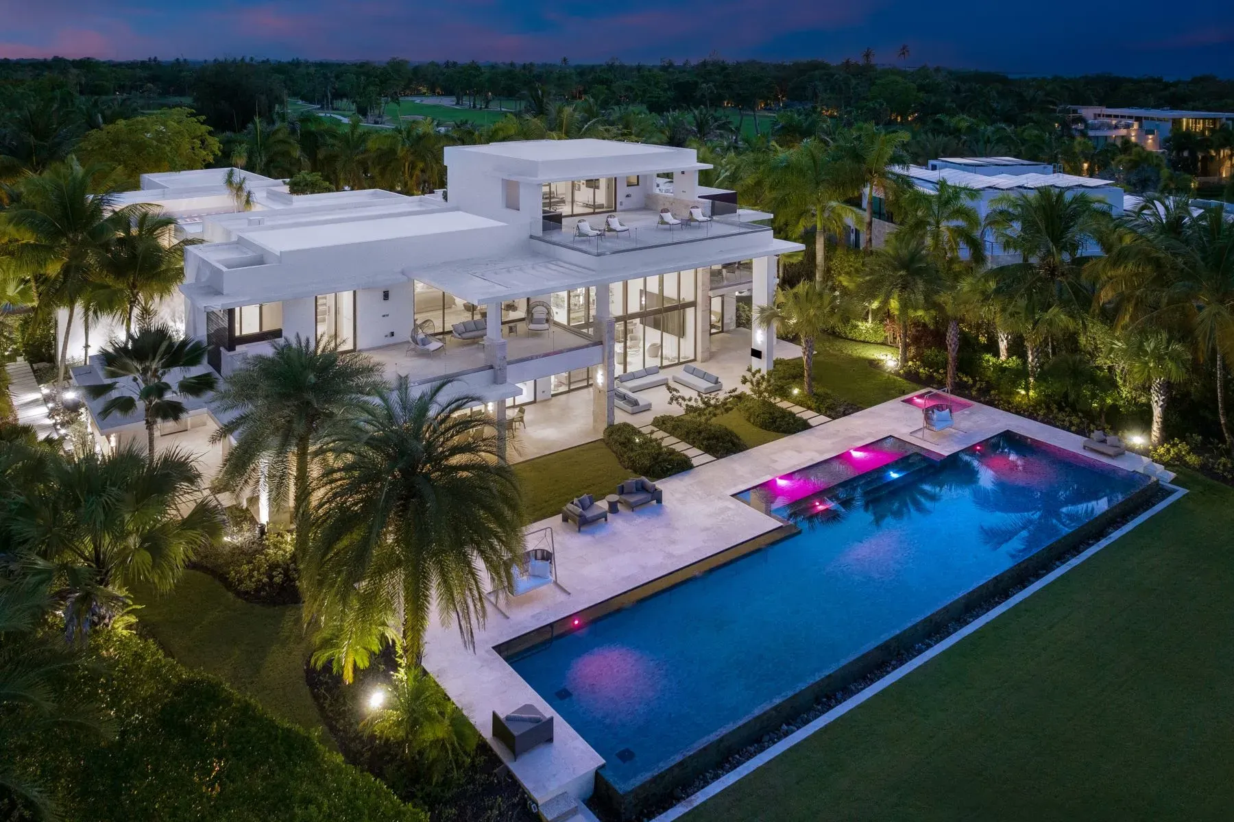 Clean white angles against all that tropical green. Very postcard.