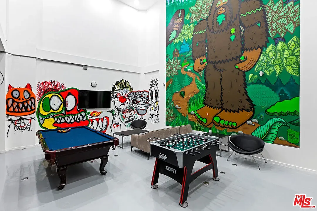 Okay, the Sasquatch mural sold me. Playroom energy meets media room.