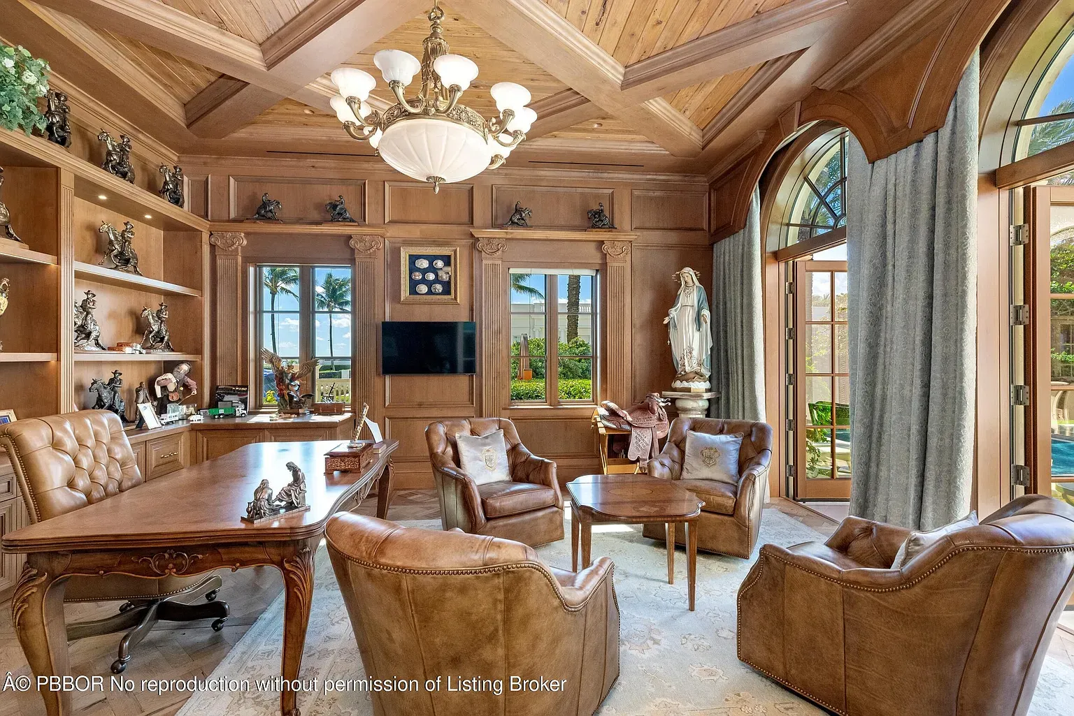 Here's the study—dark paneling and molding. Feels a secret club.