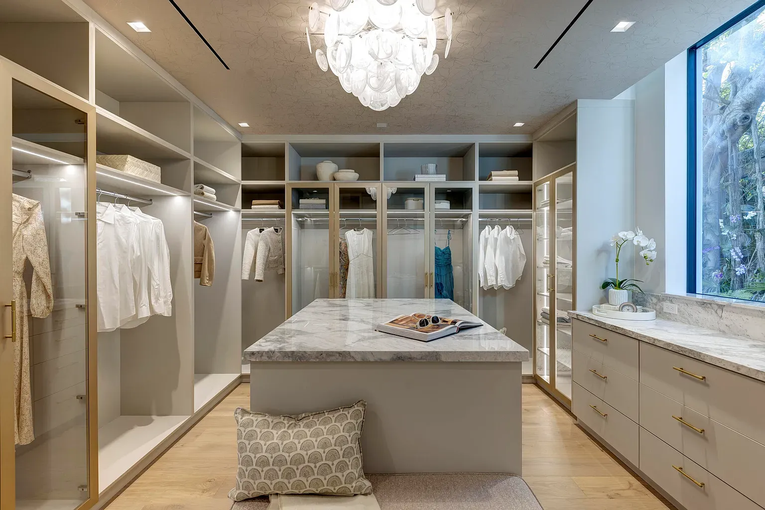 Closet is bigger than my apartment. That chandelier is doing the most.