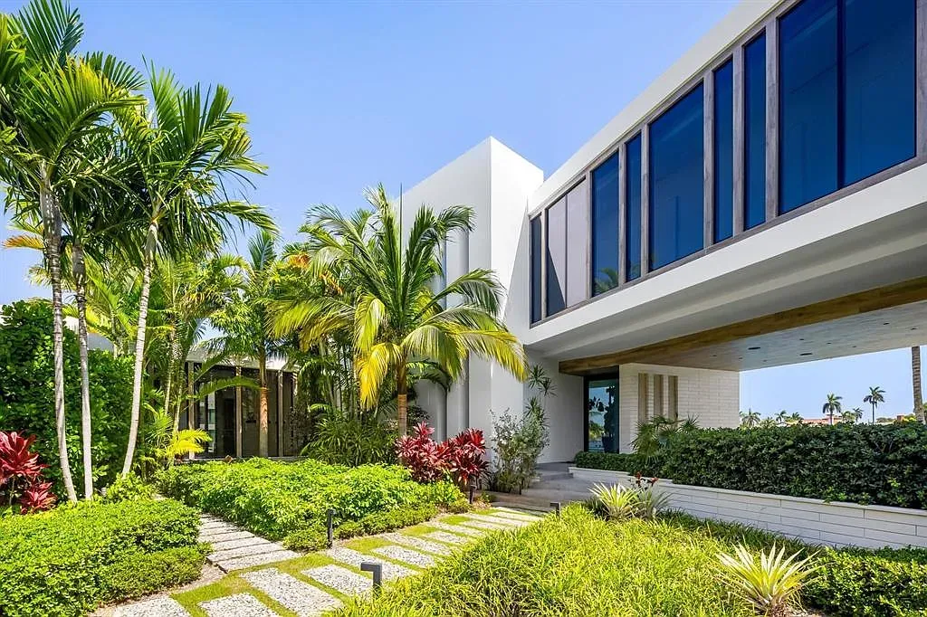 Crisp white box in the jungle. Minimalists, your mothership has landed.