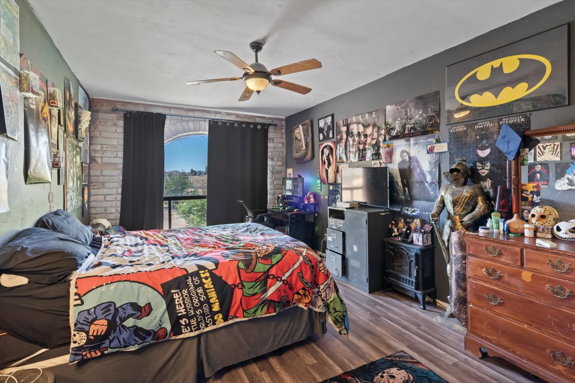 Superhero bedspread steals the show. Big, cushy bed too.