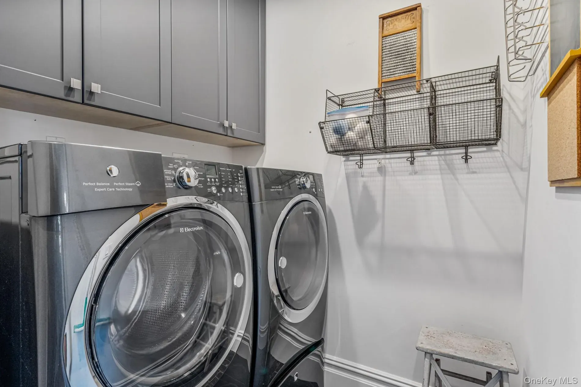 Twin black stainless machines. finally, laundry that looks cool.