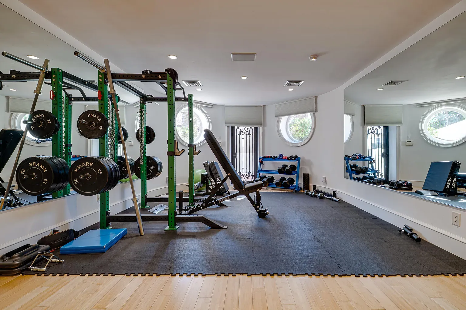 Gym pop of neon—green rack, solid bench. Someone lifts, not just poses.