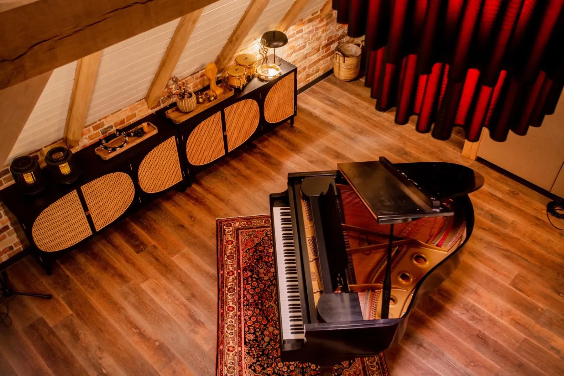 Grand piano on a Persian rug—okay, someone practices for real.