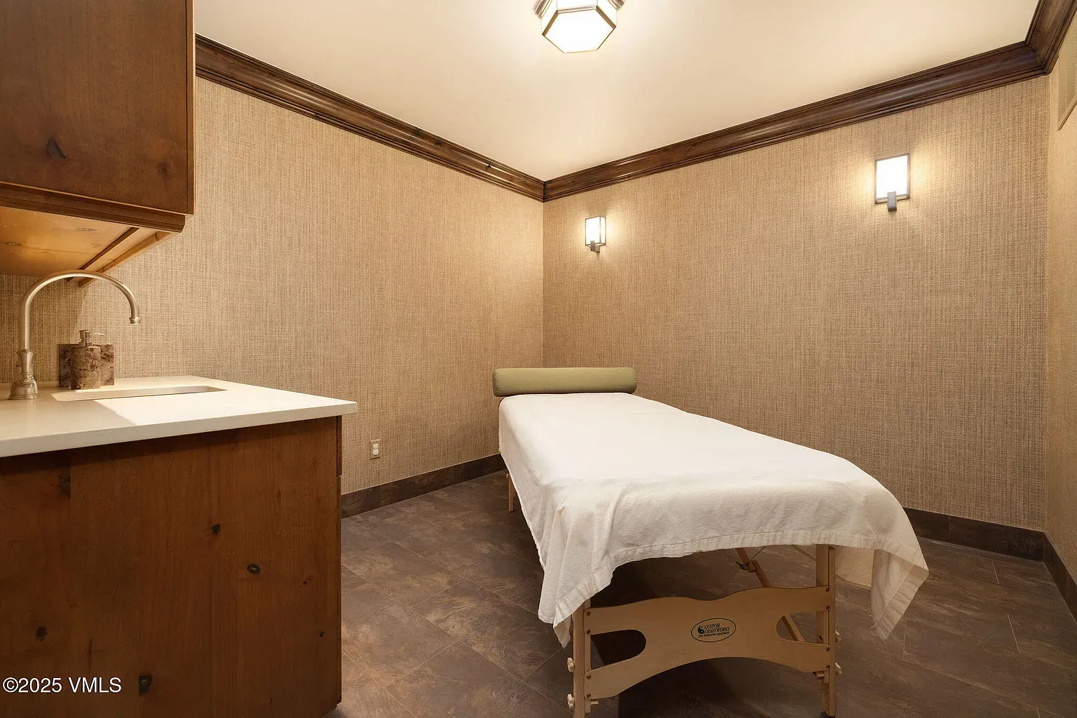 Massage room went full spa. Textured walls, warm wood. Nap incoming.