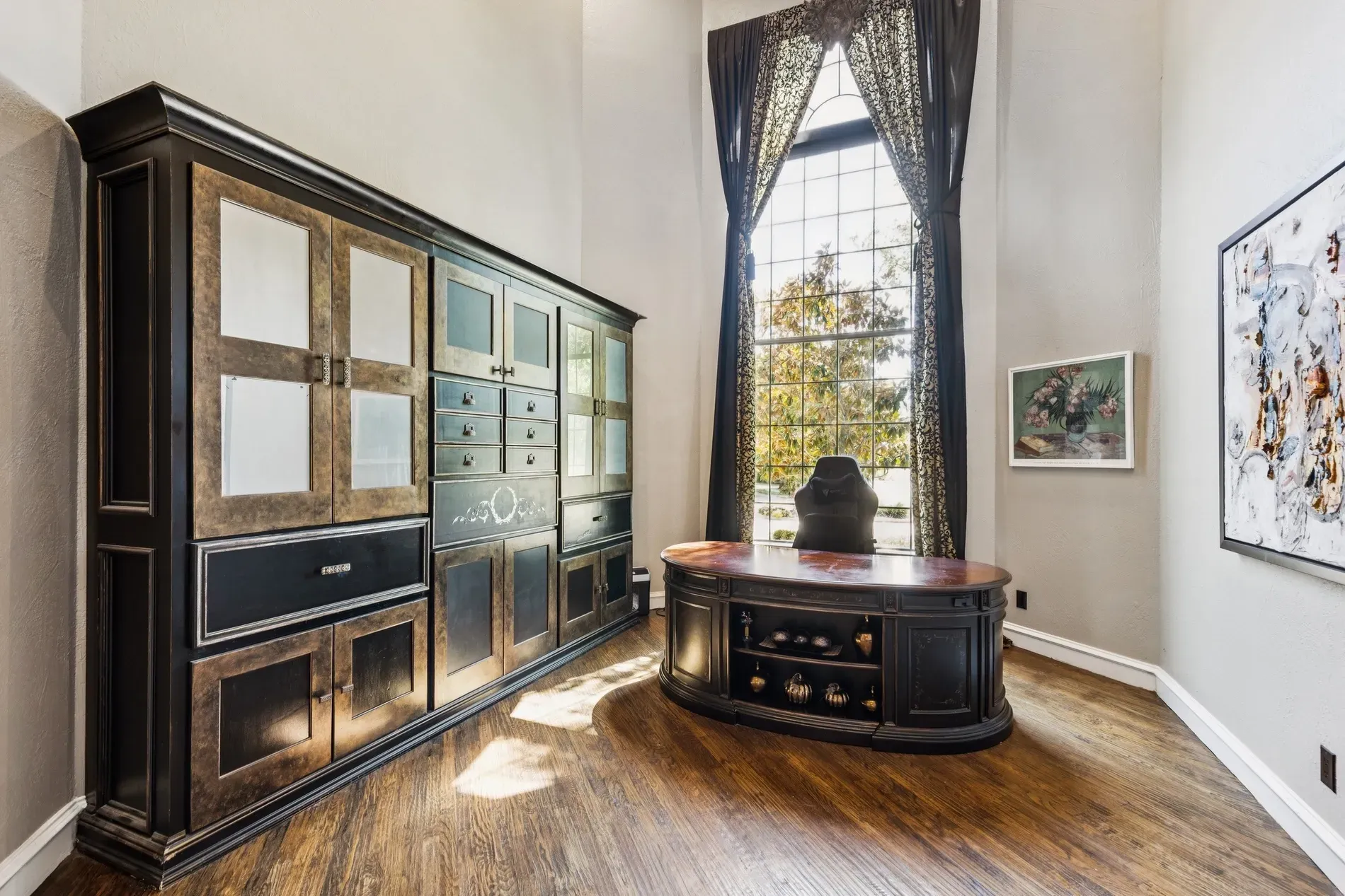 Office has height for days and huge windows. Is that a custom desk?