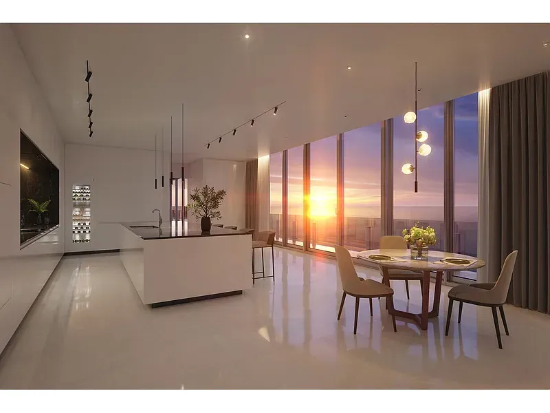 Here's the kitchen—white island, big views. Would actually cook just for the sunset.