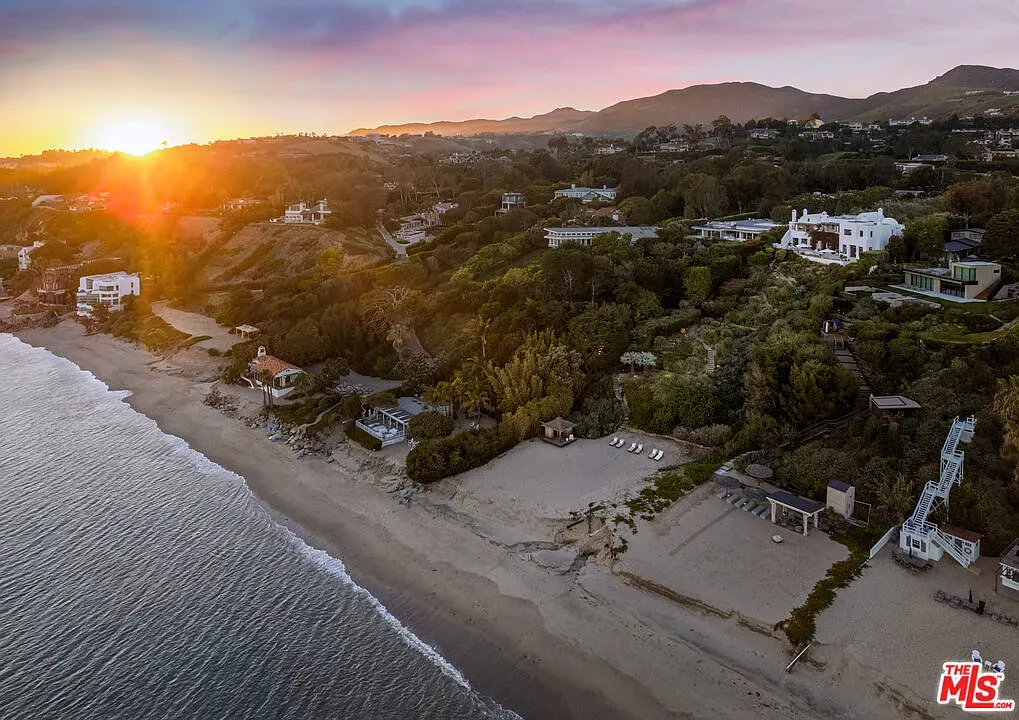 Okay, sunset beach. Dunes and grass fading to water. From here, perfect.