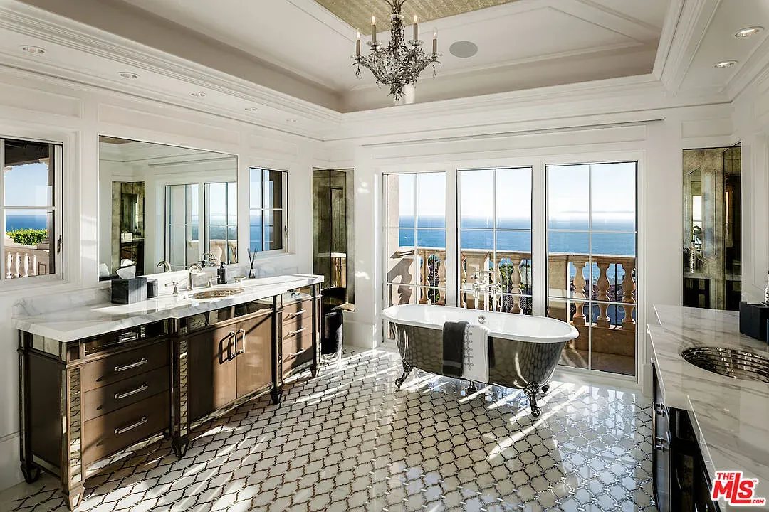 Spa bath with ocean windows. Freestanding tub just begging for dramatic bubbles.