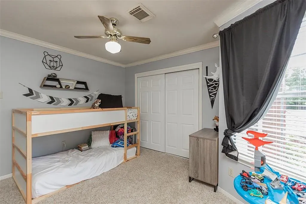 Lofted bed setup in soft gray. Feels playful but still tidy and cute.