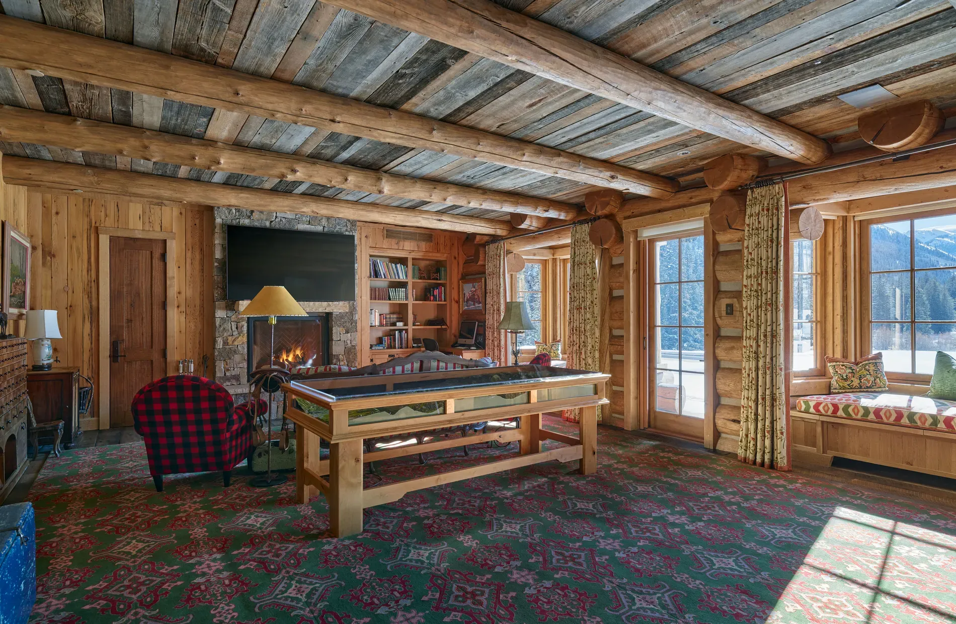 Another cozy-big room. beams overhead. I mean, cool, maybe too much timber?