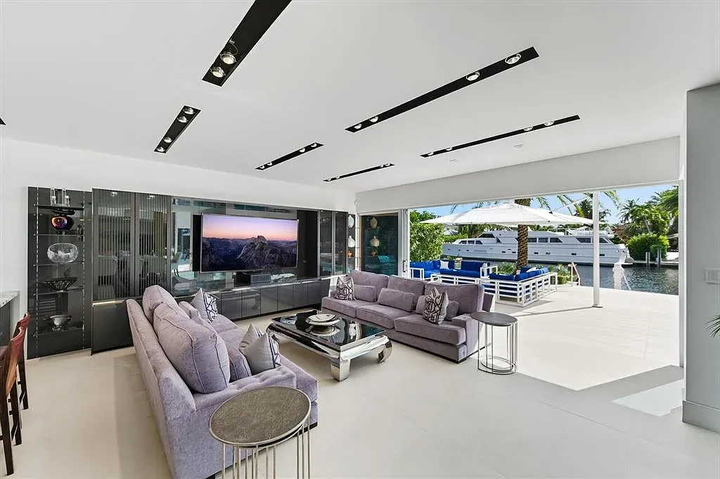 Lavender sofas were unexpected, but they work with the gray and the patio.