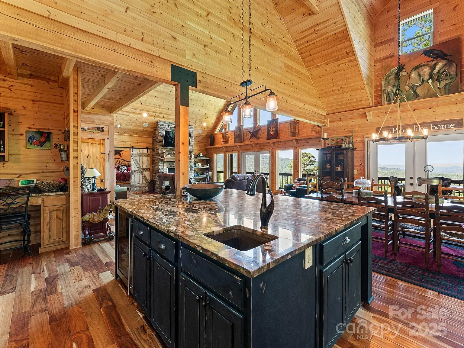 High ceilings, all wood everywhere. Feels a cabin but airy.