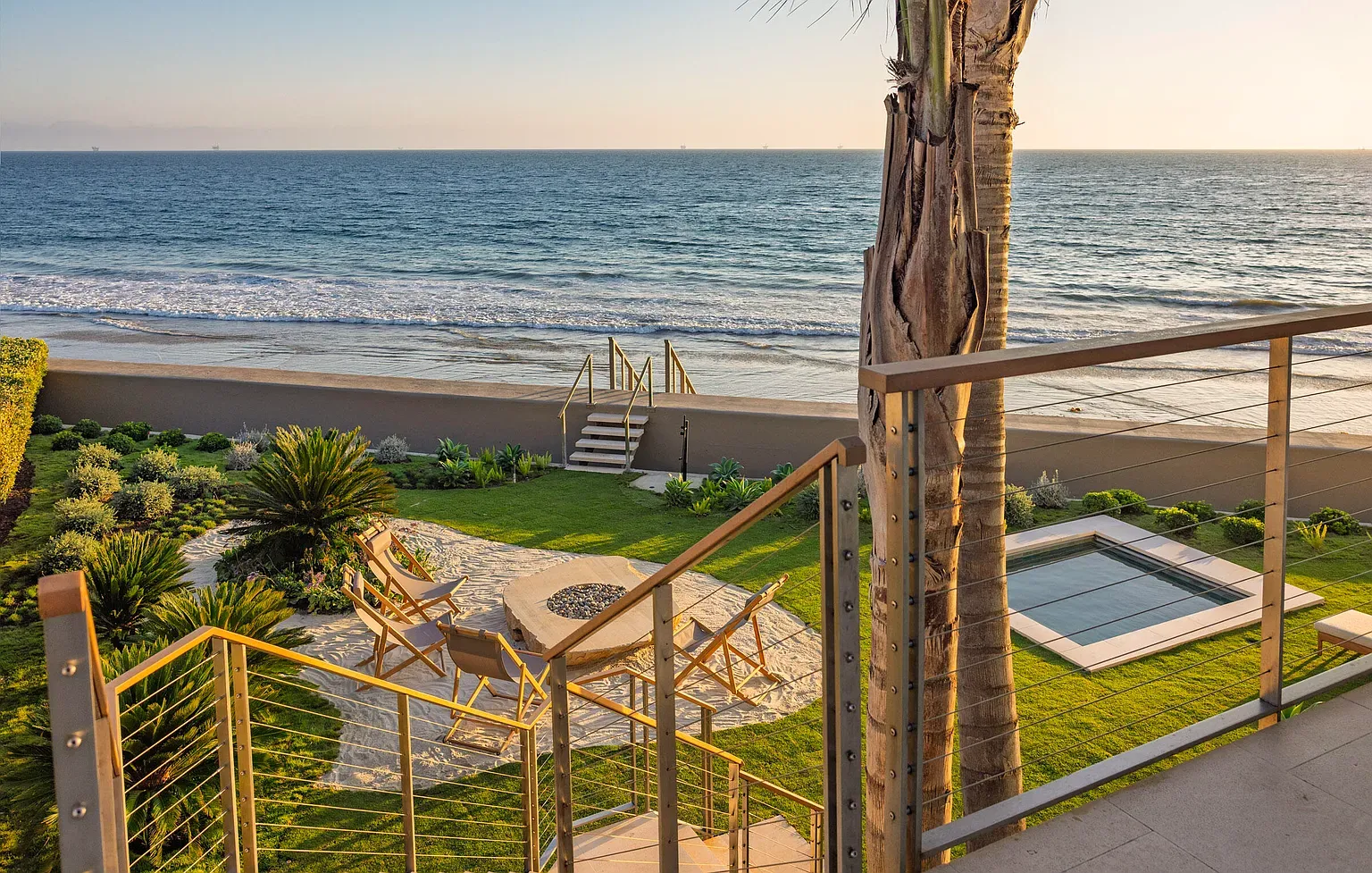 From up here. lawn, then sand, then ocean. Simple and perfect.