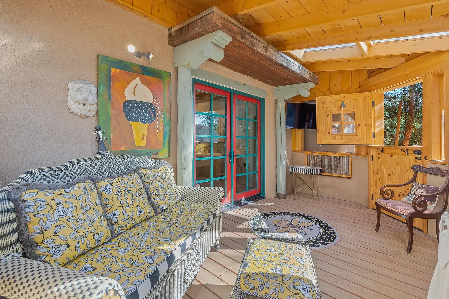 Open-air room with hefty beams. Feels a breezy living room.