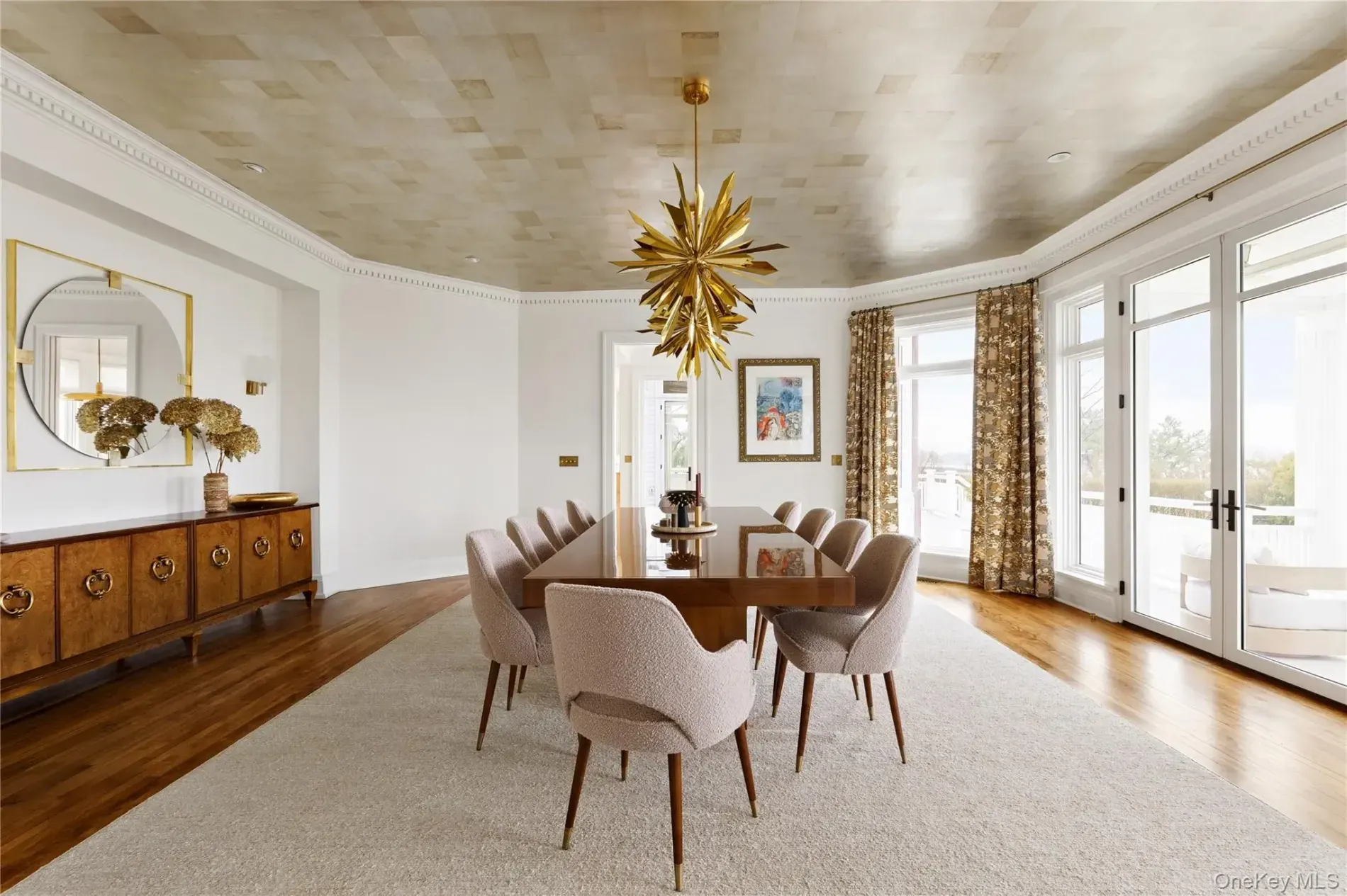 Ceiling’s shiny and fancy. Dining chairs probably hear secrets.