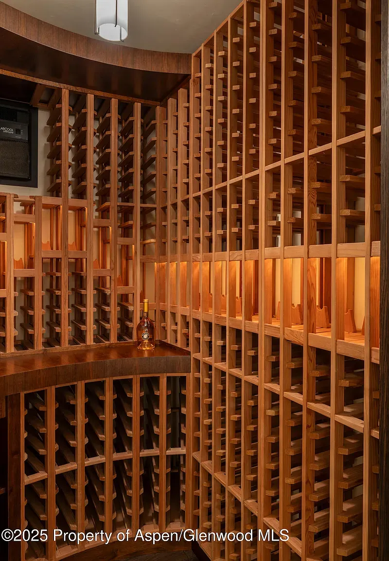 Honey wood wine cellar. Square racks, horizontal racks, bring your whole collection.