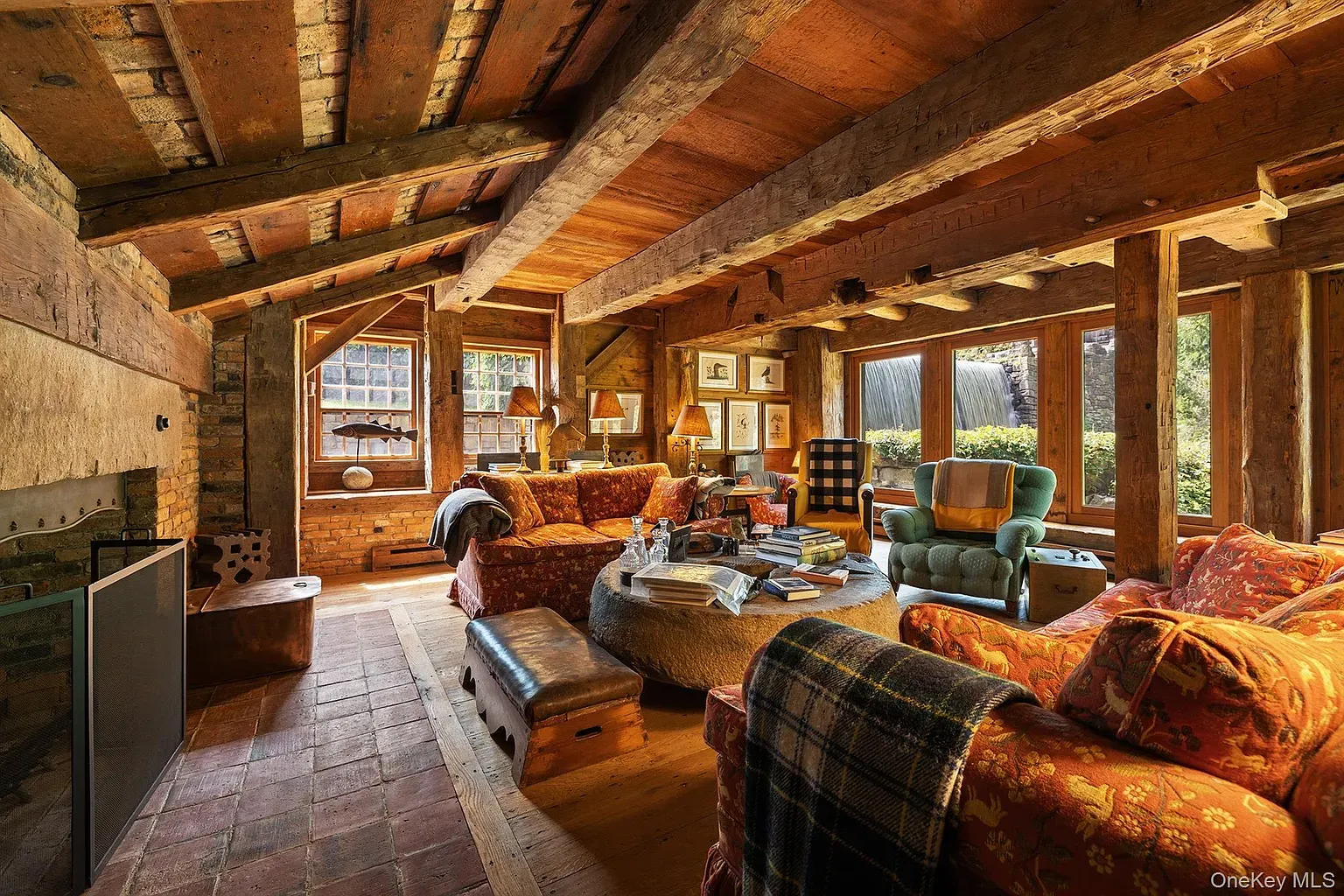 Big beams overhead, brick walls all around. Feels airy and lived-in.