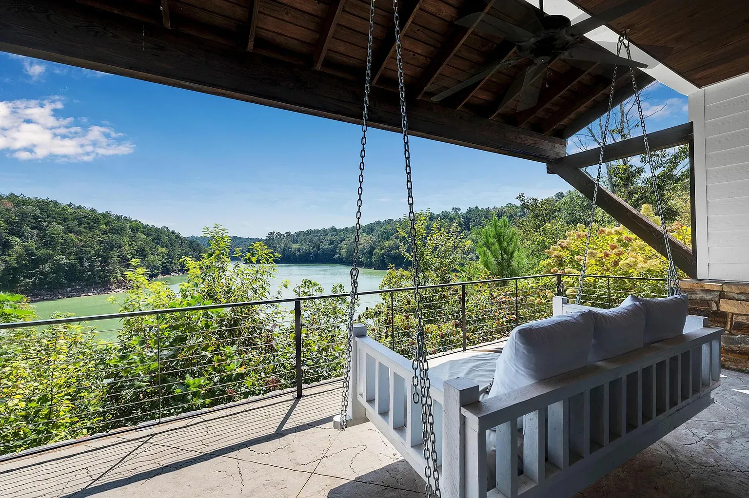 Porch goals. timber ceiling and a full-on swing bed. Nap city.