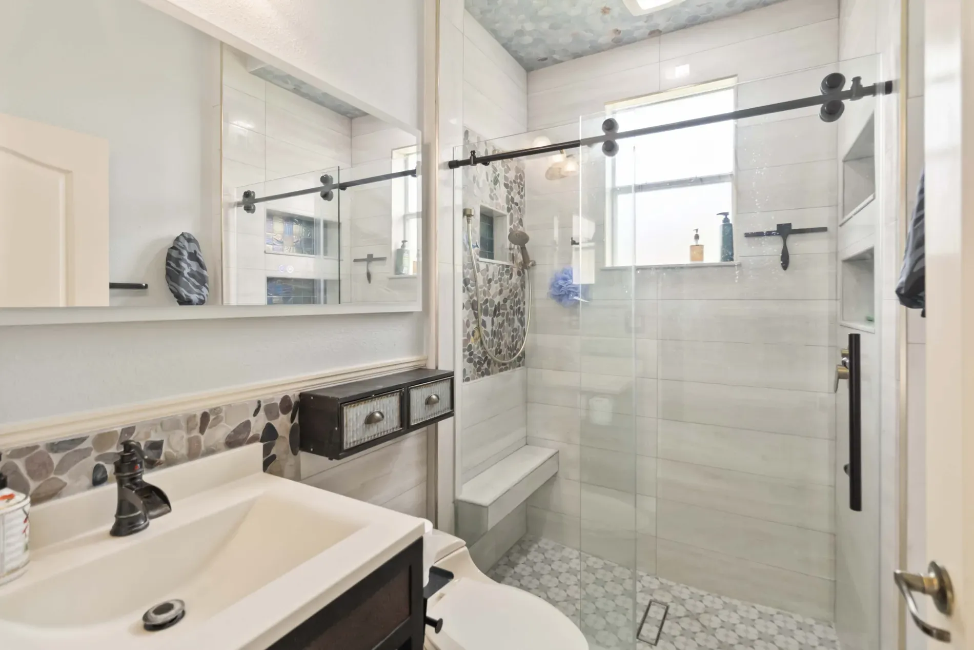 Light tiles, pale blue ceiling—anyone know why? Kinda beachy without kitsch.