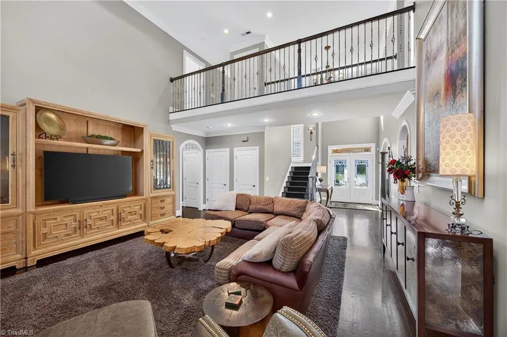 That live-edge coffee table is stealing the show. Looks cozy without trying.