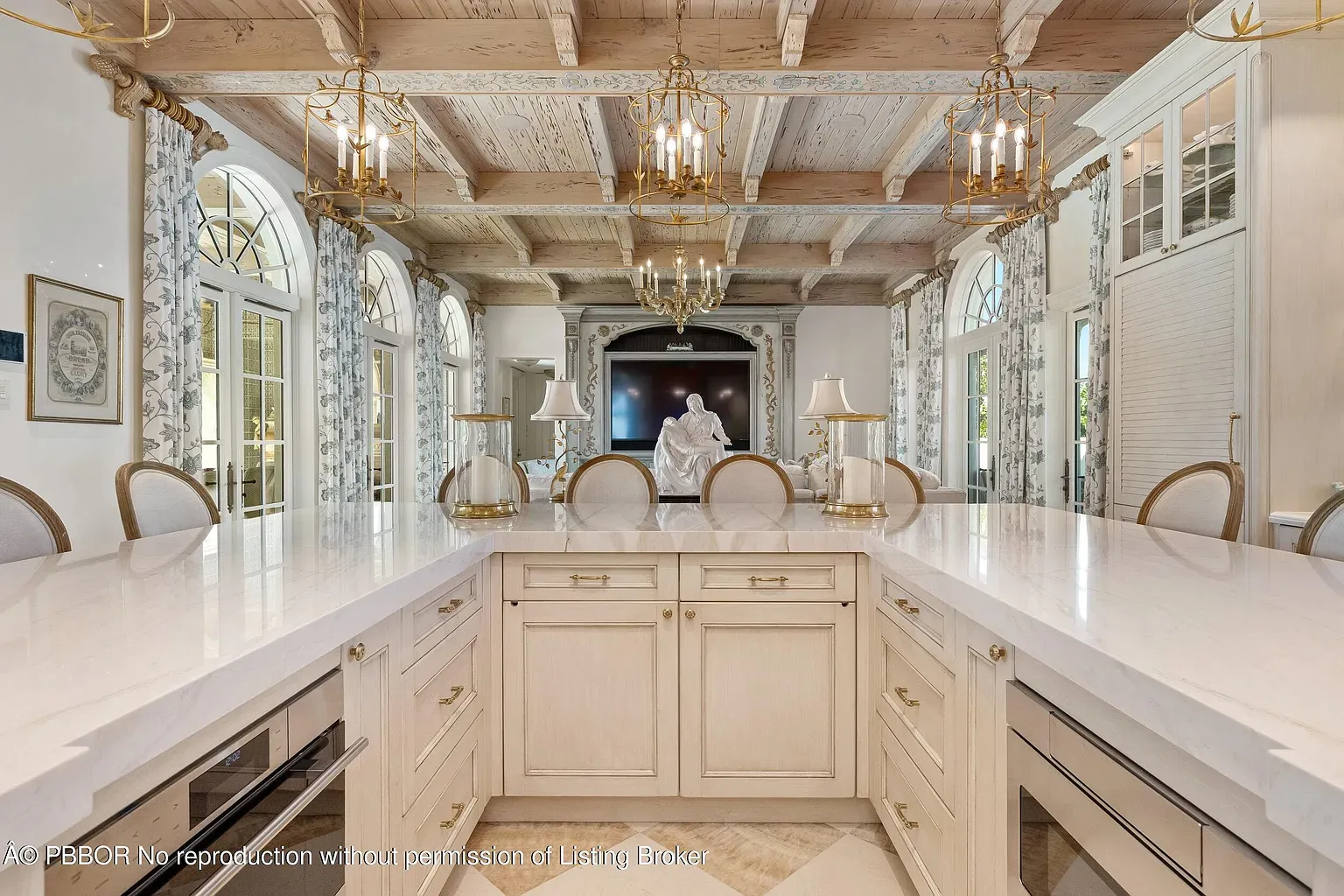 And then another kitchen—marble island this time. Shiny, showroom clean.