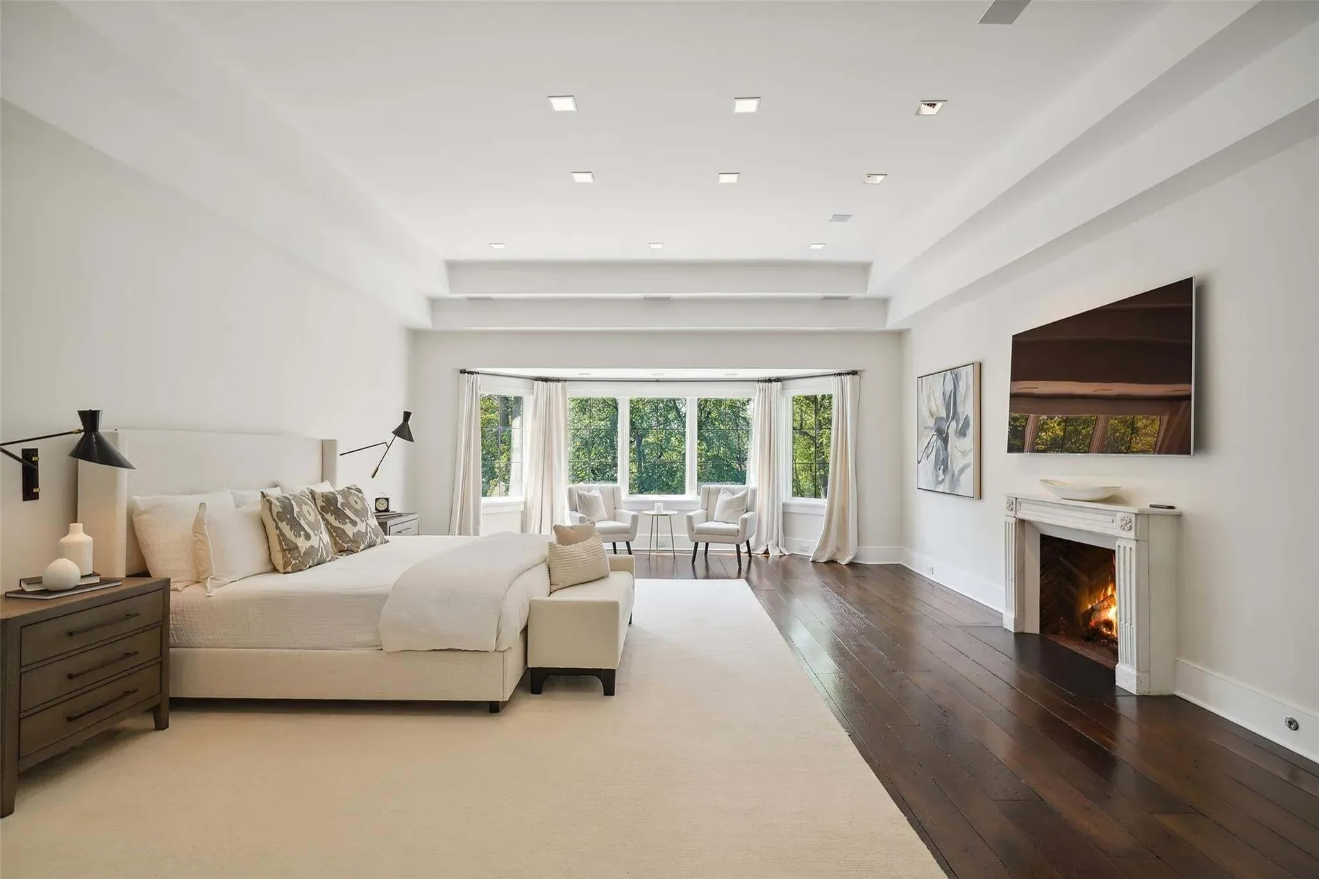 Here’s the bedroom—calm palette, big bed. Hotel energy, but warmer.