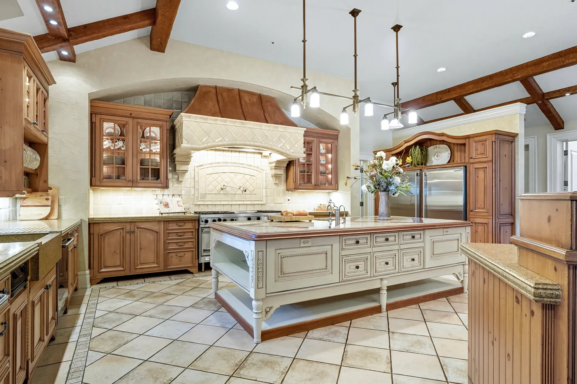 Soft blue-gray island with tons of drawers. Feels cookies happen here.