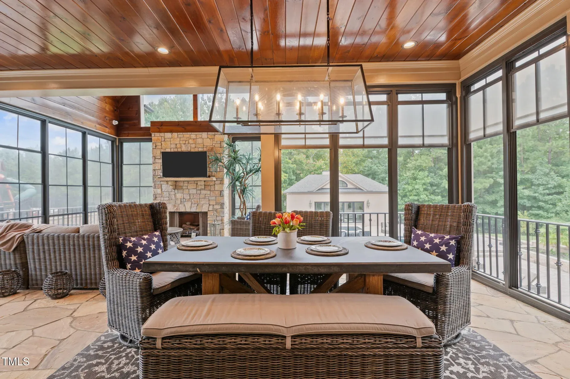 Sunroom is basically a greenhouse. Wall-to-wall glass, slow-breath energy.