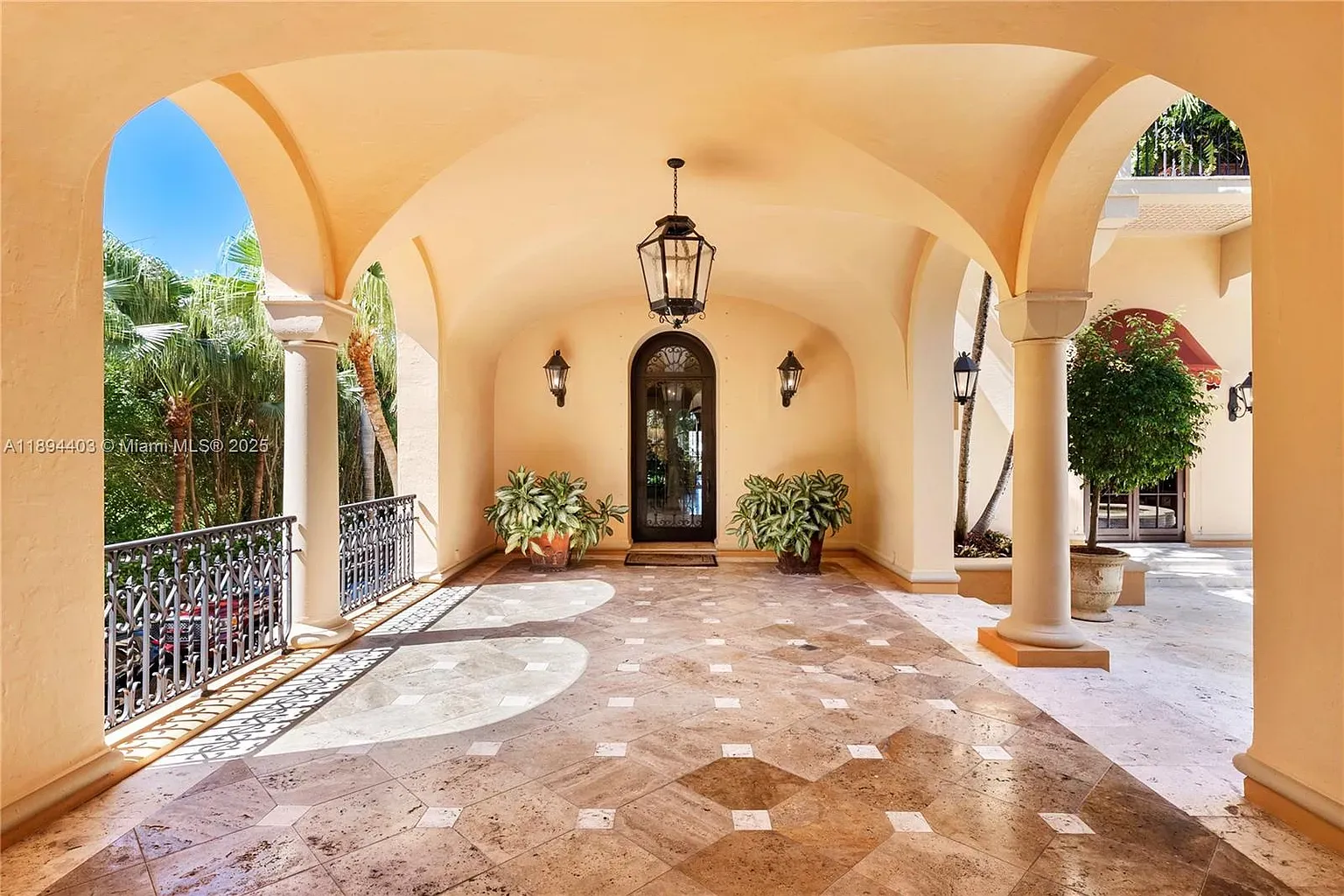 Covered entry with russet mosaic stone. Anyone know how you clean this?