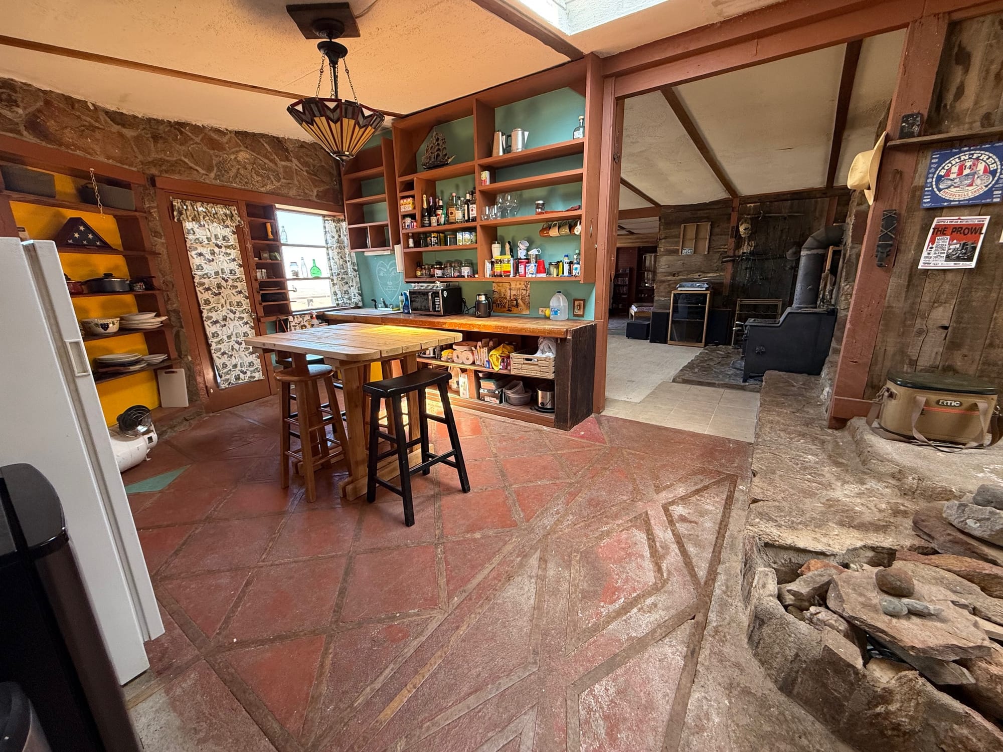 Terracotta patterned floor makes the kitchen feel warm even without the oven on.