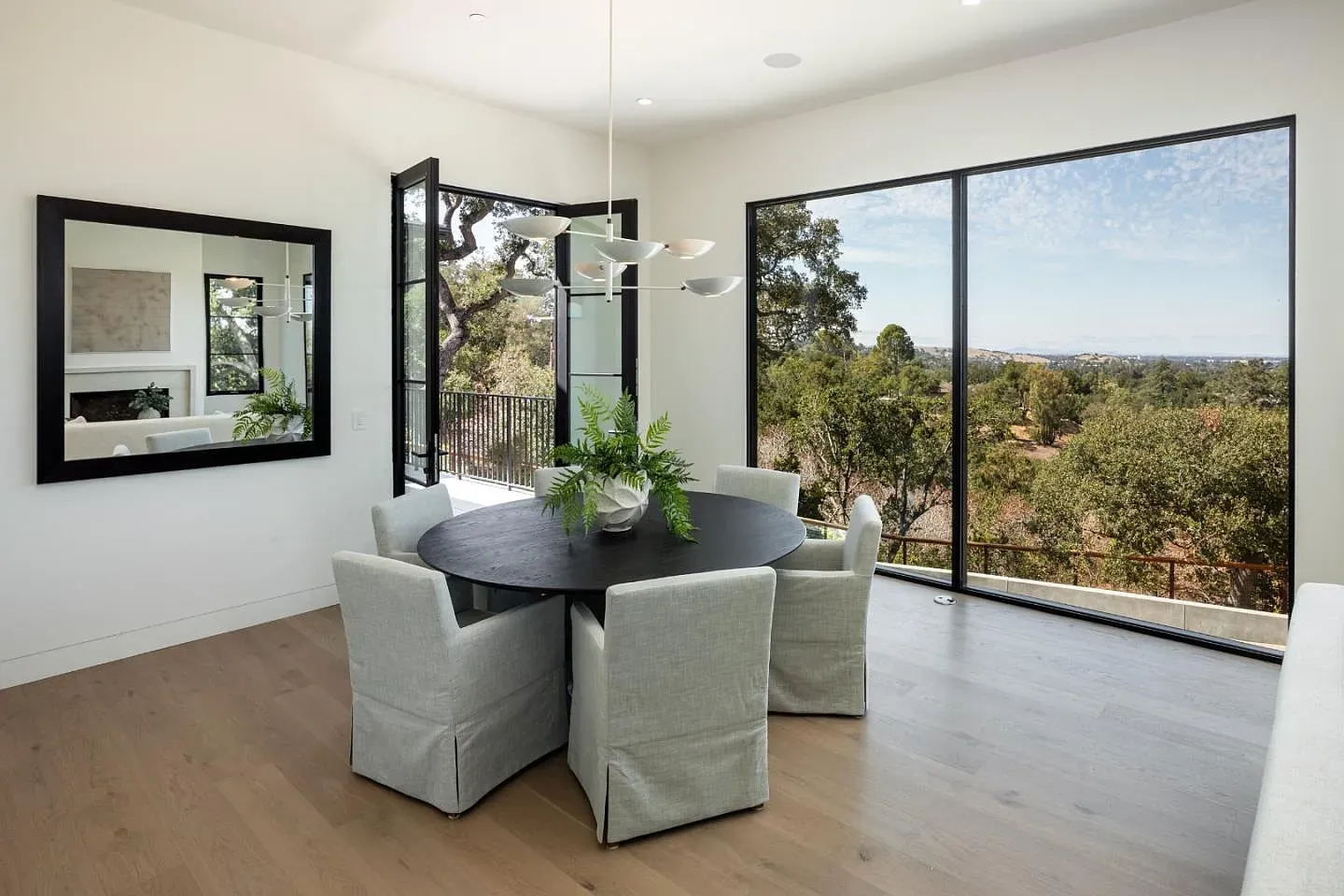 Dining next to huge glass. Dinner comes with a view every night.