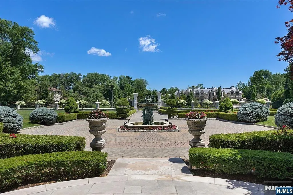 Central fountain with brick loop path. Fancy, but peaceful.