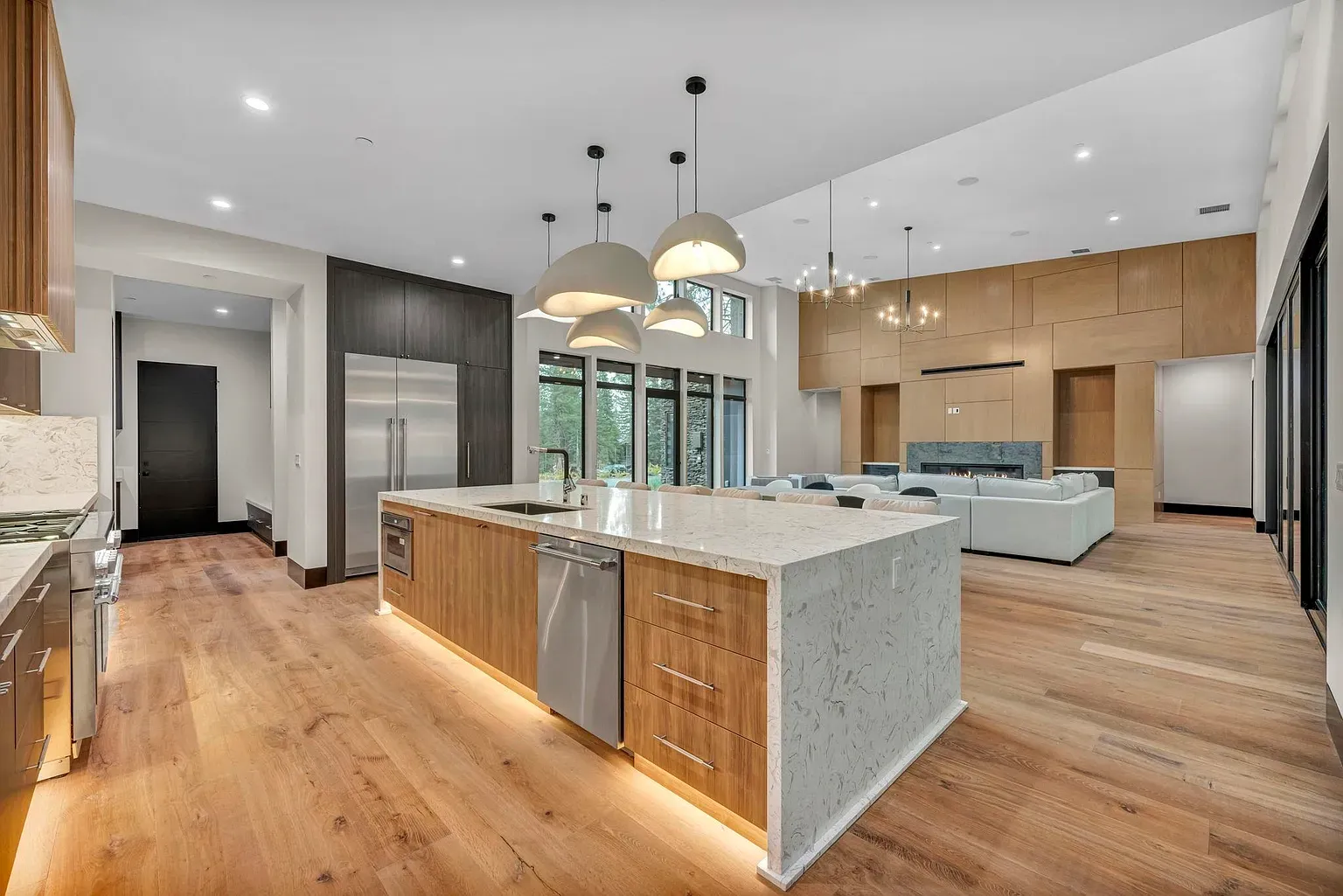 That light oak and white marble combo is doing all the heavy lifting.