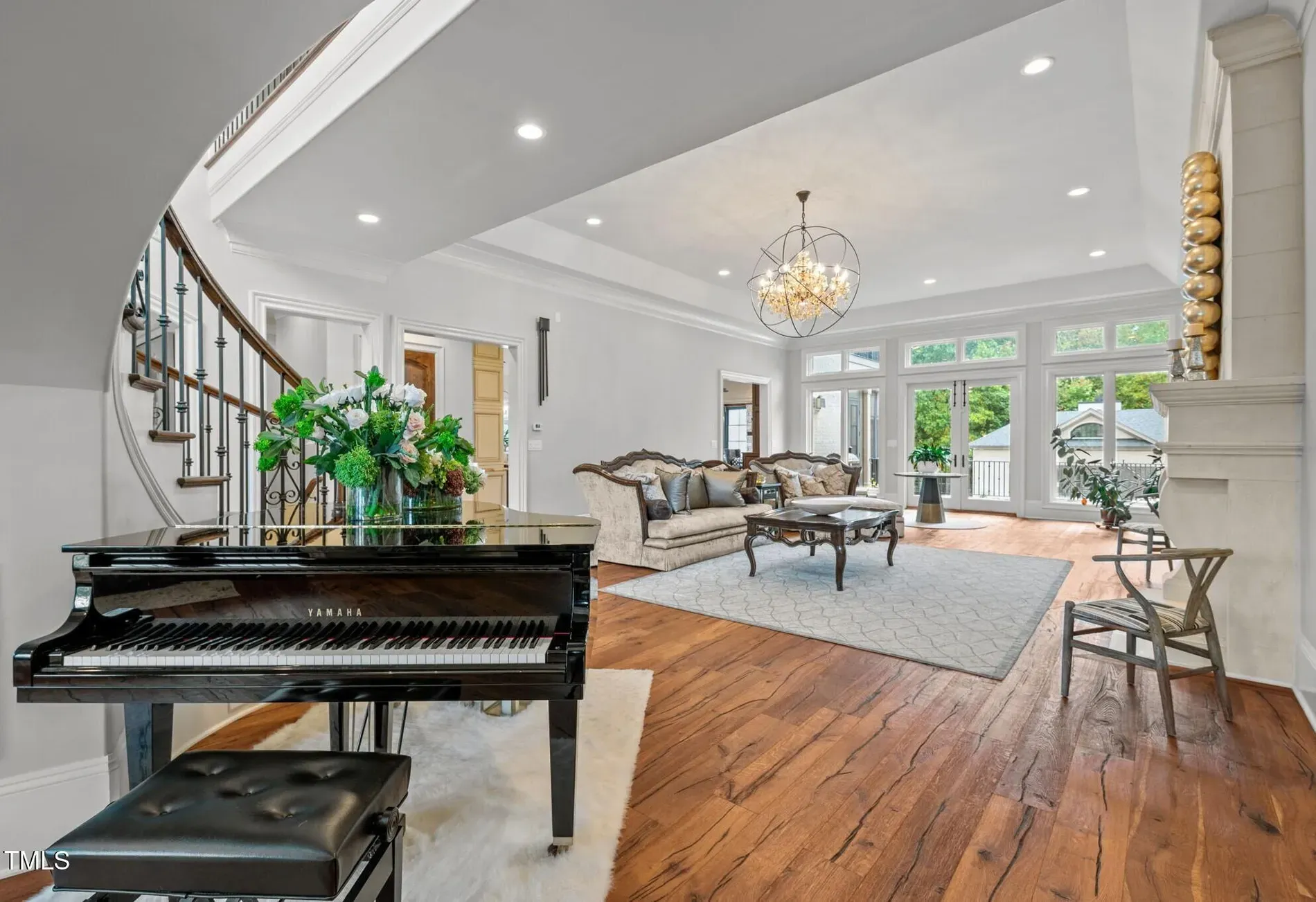 Living room in creams and whites. Airy, soft, very magazine.