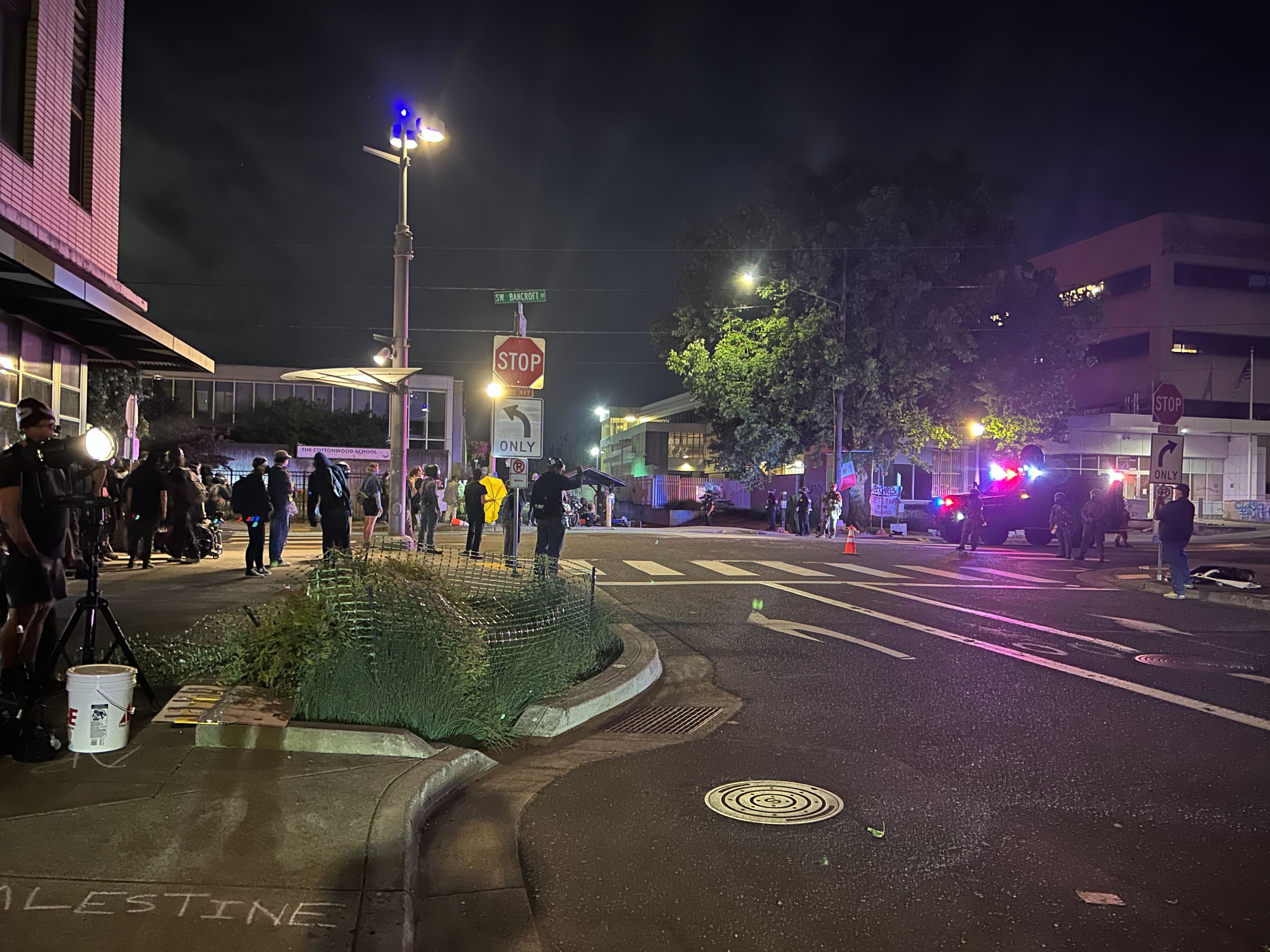 Federal officers, protesters clash in small demonstration