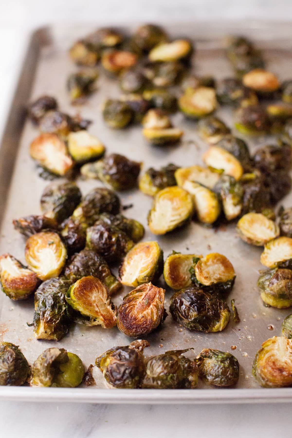 a serving of food with overcooked Brussels sprouts