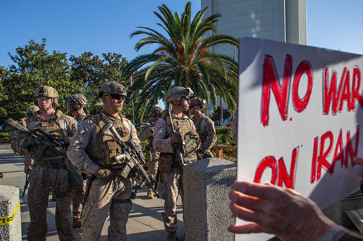 Newspaper headline about Trump and Iran