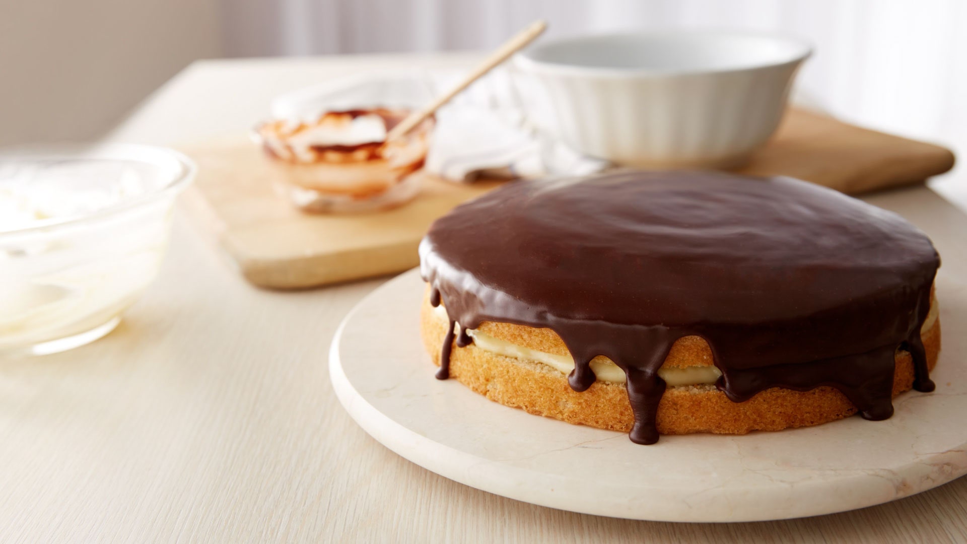 a classic Boston Cream Pie with a thick chocolate glaze