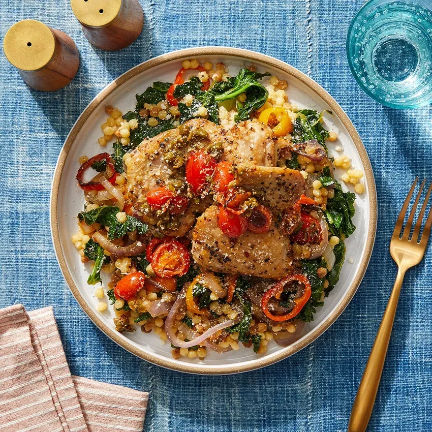 Oregano Chicken Thighs & Fregola Sarda with Tomato-Caper Pan Sauce
