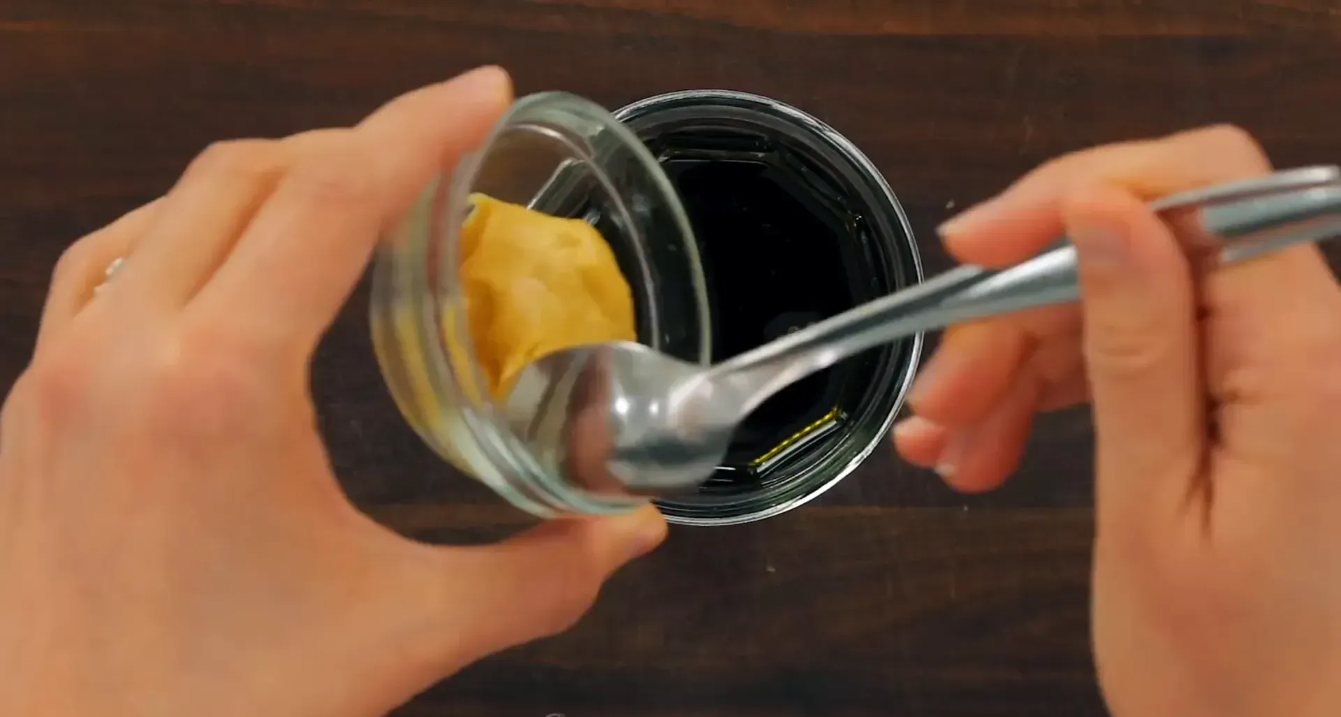 Ingredients for dressing in a mason jar.