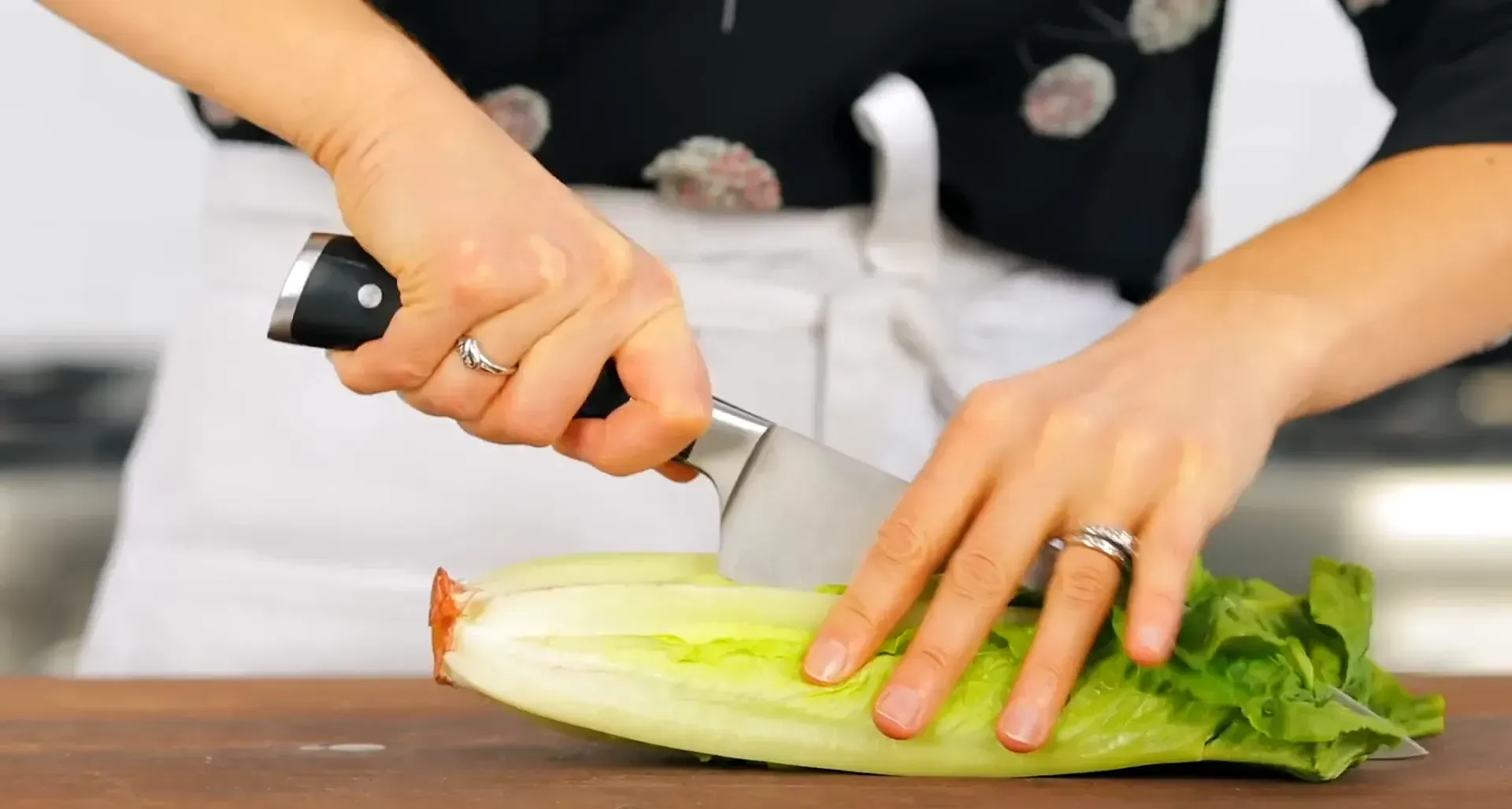 Chopping romaine lettuce.