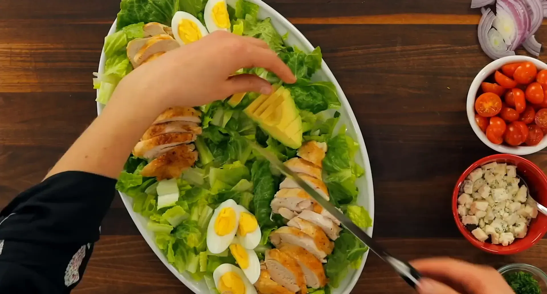 Avocado arranged on the salad.