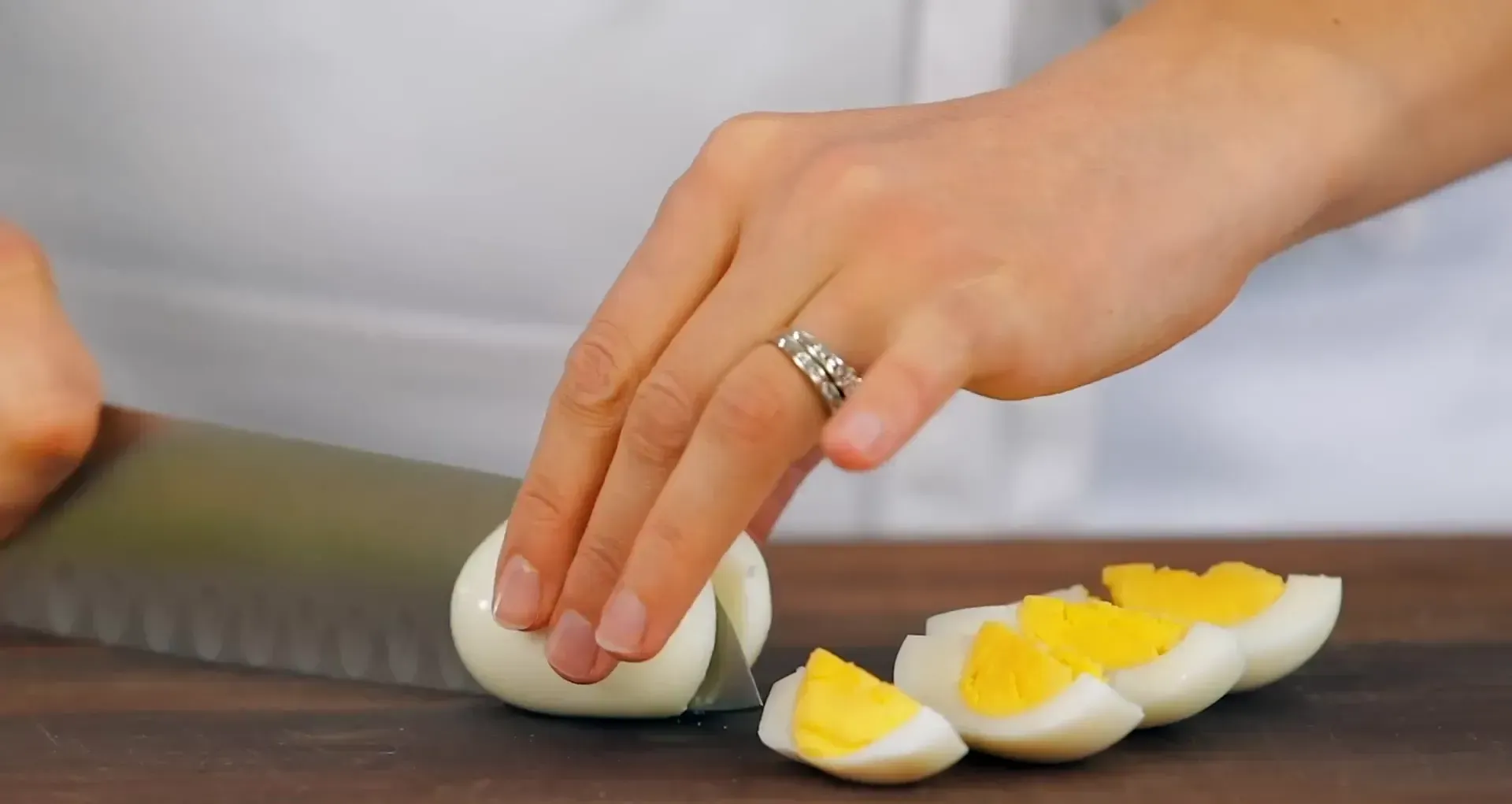 Layering egg quarters.