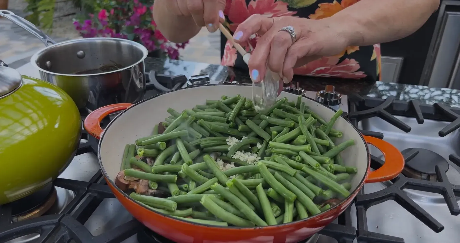 Adding garlic to the pan