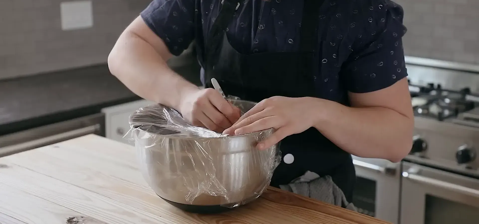 Dough rising in a bowl.